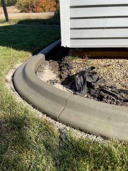 image of mowers edge concrete curbing in a customer's yard.