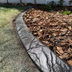 Hand Carved Slant curbing in the style of Parkland Paver.