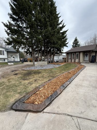 Hand carved concrete curbing for a happy homeowner.