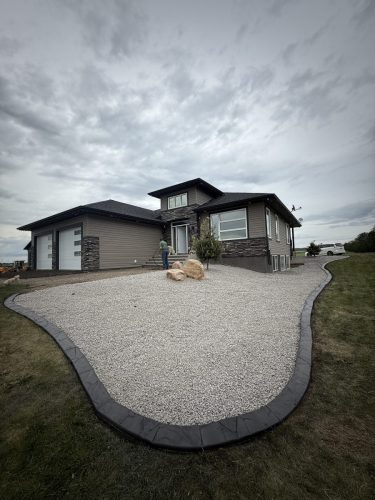 Hand carved concrete curbing for a happy homeowner.