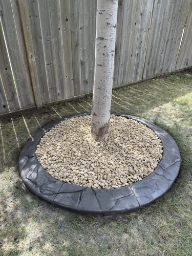 Hand carved concrete curbing for a happy homeowner.