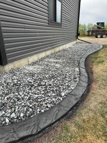 JBs Custom Curbing recent landscaping and curbing project.